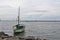 anchored sailboat on jakarta beach