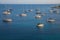 Anchored sailboats off the coast of Kastos island, Ionian sea, Greece in summer.