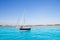 Anchored sailboats in turquoise Formentera beach