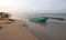 Anchored small fishing boat on Nilaveli beach in Trincomalee Sri Lanka