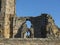 Ancient abbey ruins with gothic windows architecture