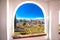 Ancient Alhambra view through stone window