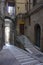 Ancient alleyway in Perugia historic city centre, Italy