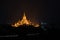 Ancient Ananda Pagoda before sunrise with lightup, Bagan