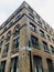 Ancient apartment building in Venetian Gothic style located on the corner of Farringdon Road and Greville Street