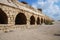 Ancient aqueduct near the sea in Caesarea