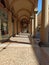 An ancient arcade in independence street in Bologna Italy