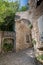 Ancient arch in the alleys french village in Provence Oppede le Vieux