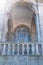 Ancient arch terrace made of stone with a blue mosaic painted in the exterior wall of a church Cathedral in Porto