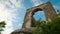 Ancient arch under blue sky
