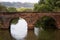 Ancient arched bridge over the river