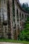 Ancient arched stone railway bridge