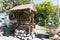 Ancient artesian well and wooden roof and wooden pulley.