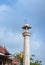 ancient artistic holy jain temple holy pillar with cloudy sky at morning