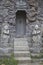 Ancient balinese door closed with sculptures