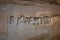 Ancient bas-relief in stone. The ruin of ancient temples near the village of Hampi. India