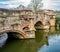 The ancient Bishops Bridge over the River Wensum, Norwich, Norfolk