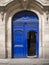 Ancient blue wooden opened door