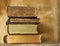 Ancient books on wooden background