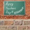 Ancient brick wall with Happy teacher day title