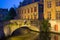 Ancient bridge at Dijver Canal in Bruges at night. (Belgium)