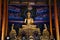 Ancient buddha in antique ubosot ordination hall of Wat Don Khanak temple for thai people travelers travel visit and respect