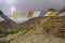 Ancient Buddhist Caves and Prayer Flags in the High-Altitude Mountain Desert