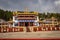 Ancient buddhist colorful monastery with cloudy sky from different angle at day