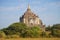 Ancient Buddhist temple of Thatbyinnyu Phaya in the sunny day. Bagan, Myanmar Burma