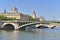 Ancient building of the conciergerie and bridge of Sully from river the seine