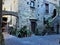 Ancient building, stairway and arch. Plants, history and time in Viterbo city, Italy