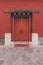 The ancient buildings with red wall, yellow or gray tile roof, door gate in the Forbidden City, Beijing, China