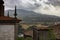 Ancient buildings with steeples on river Minho bank. Top provence view in Tui, Spain. Medieval architecture concept.