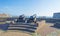 Ancient cannons protecting the coast of the dutch city of Vlissingen below a blue sky