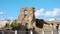 Ancient castle Rocca Galliera ruins standing behind fence