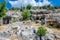 Ancient cemetery in the city of Limyra, Turkey. The entrance to the old concrete tomb in the rock. Excursion to the