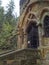 Ancient chapel carved in sandstone rock Modlivy Dul dedicated to the Virgin Mary of Lourdes in beautiful autumn forest near