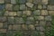 Ancient charm moss covered stone wall, a timeless and rustic texture