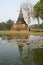 An ancient Chedi on the lake. Sukhothai historical Park