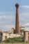 Ancient chimney of an abandoned resin factory in Cabezuela in the province of Segovia in Spain. Example of depopulation of the