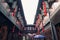 Ancient chinese alley with red lanterns and wooden windows in traditional market