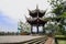 Ancient Chinese gazebo on mountaintop viewing platform in cloudy