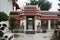 Ancient Chinese political nobleman rock statues is in front of the entrance to Wat Pho temple.