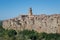 Ancient city Pitigliano on hill in Toscana