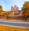 Ancient city wall and medieval brick buildings of Torun old town, UNESCO world heritage site, in Autumn