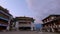 Ancient colorful buddhist monastery with dramatic sky time lapse at morning