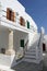 Ancient column is used to support the upper part of a house in Kastro traditional village, Sifnos island, Greece.