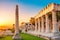 Ancient construction in Athens, Ancient Agora of Athens in Greece beautiful sunset.