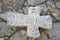 Ancient cracked stone cross