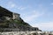 Ancient  defense tower Torre Paola on a hill near the Mediterranean Sea in the Circeo National Park. Coast of Lungomare di